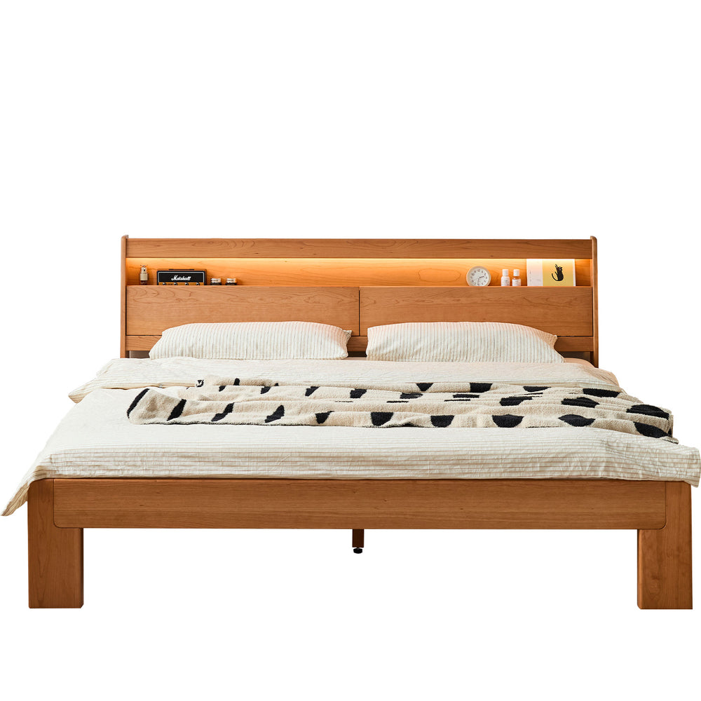 Scandinavian cherry wood bed accompany light in white background.