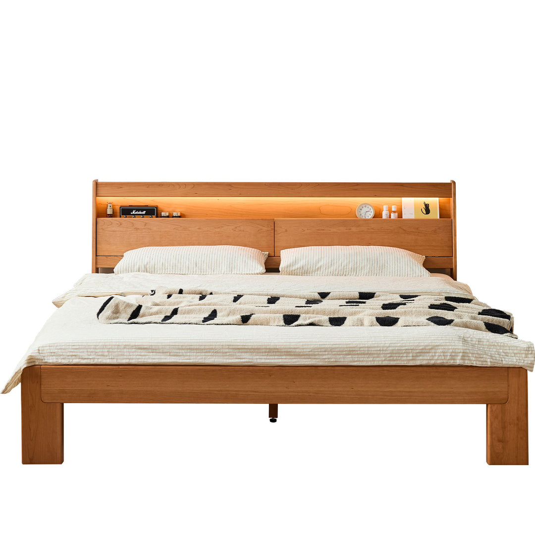 Scandinavian cherry wood bed accompany light in white background.