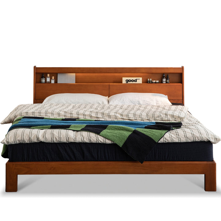 Vintage boxwood bed accompany light in white background.