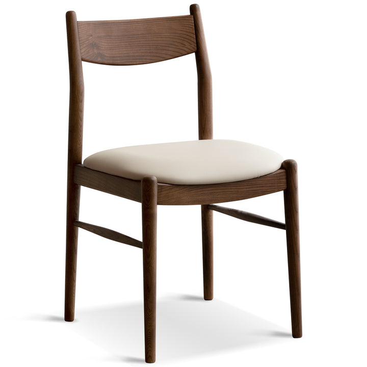 Vintage walnut wood dining chair purea in white background.