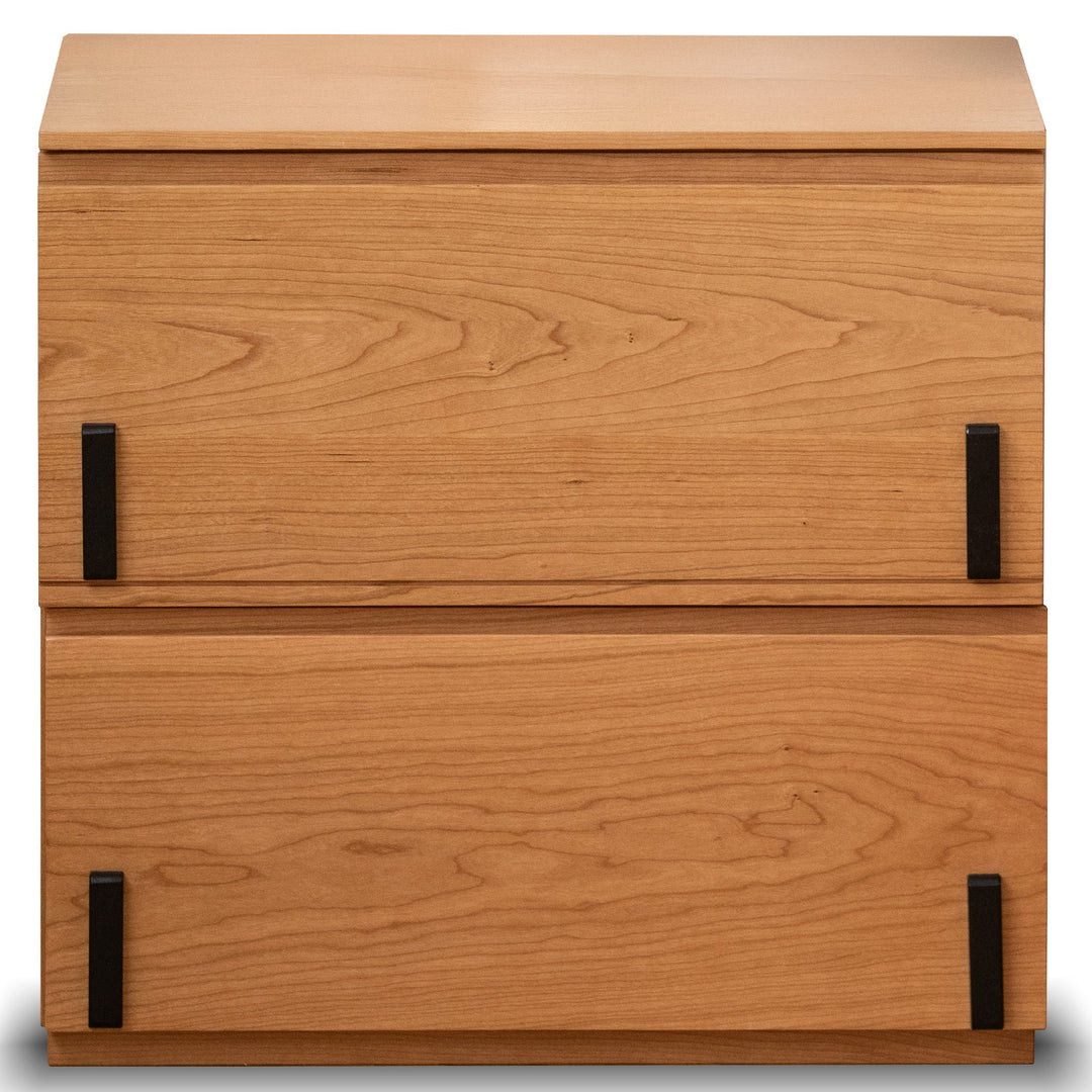 Wooden cabinet with two drawers and black handles on a white background