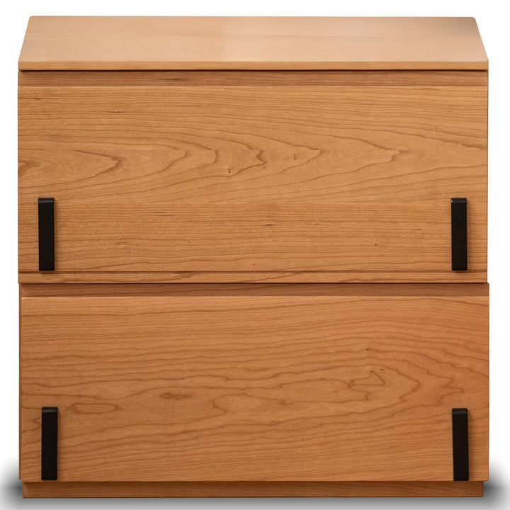 Wooden cabinet with two drawers and black handles on a white background