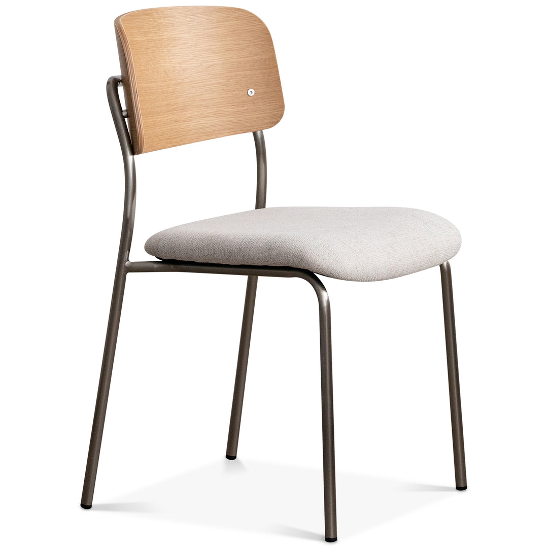 Minimalist ash wood veneer cotton fabric dining chair aeri in white background.