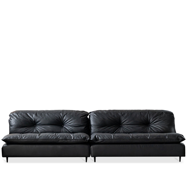 Vintage genuine leather 4 seater sofa riga in white background.