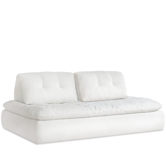 Cream boucle fabric modular 2 seater sofa couch bloc in white background.
