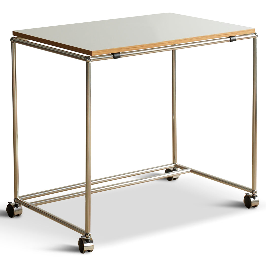 Minimalist steel wheeled study table usm situational feels.