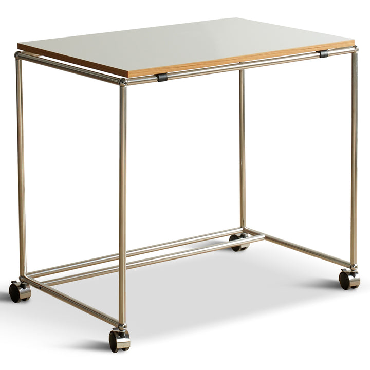 Minimalist steel wheeled study table usm situational feels.