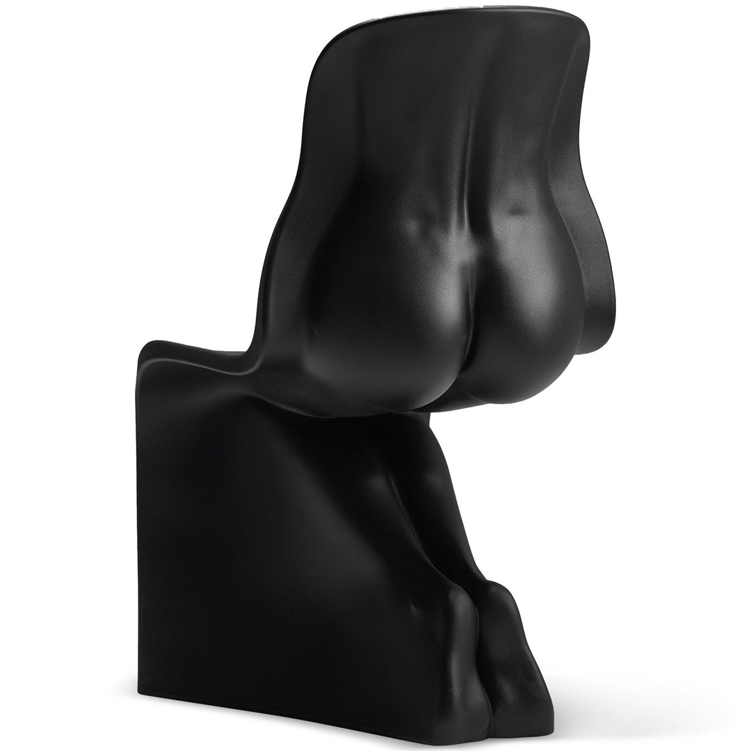 Bauhaus plastic dining chair her in real life style.