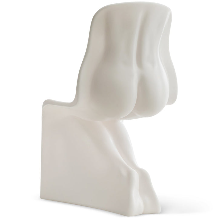 Bauhaus plastic dining chair her in white background.