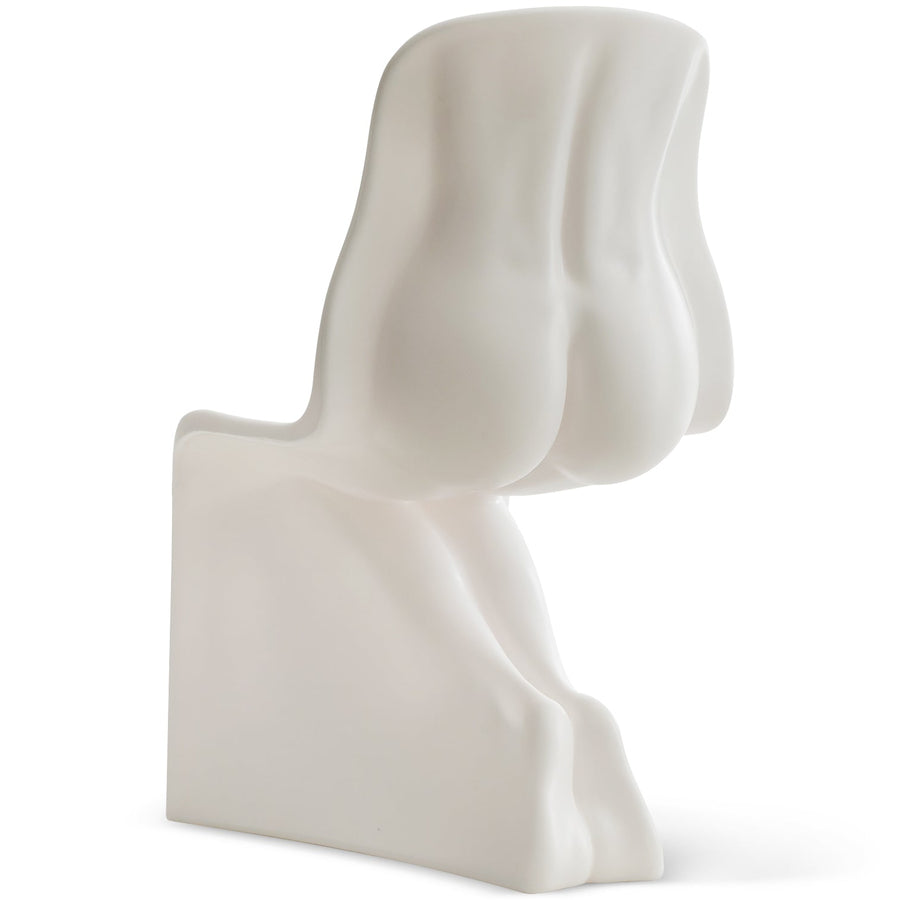 Bauhaus plastic dining chair her in white background.