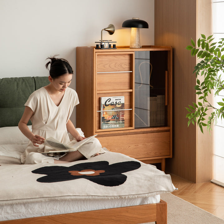 Scandinavian cherry wood side cabinet vista in details.