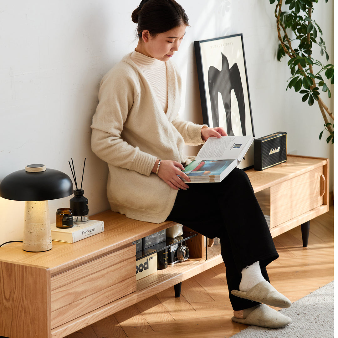 Scandinavian oak wood tv console lyne in close up details.