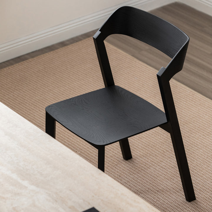 Minimalist ash wood dining chair pearl in real life style.