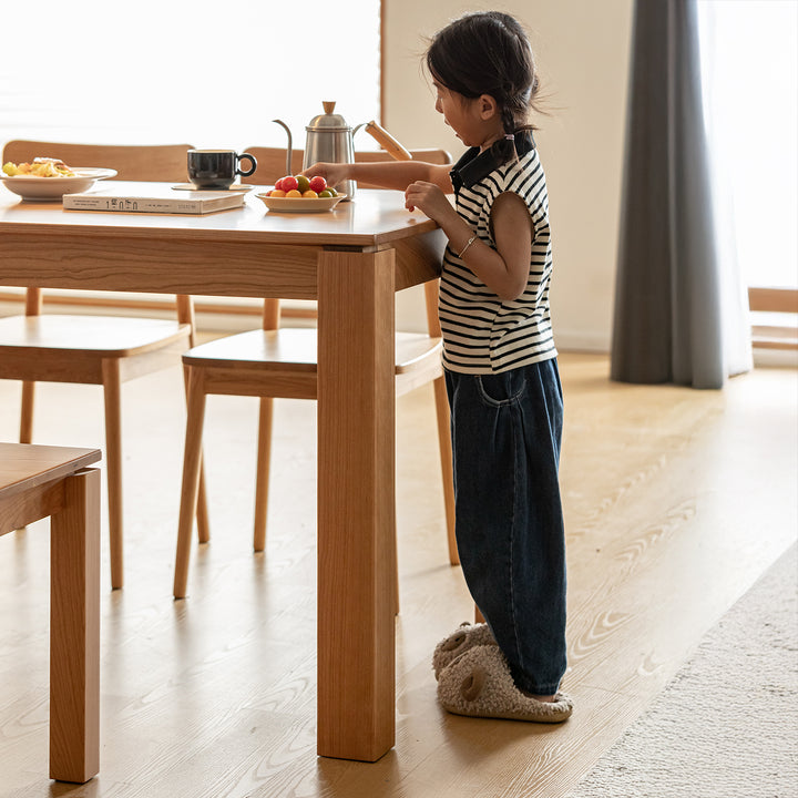 Scandinavian cherry wood dining table shoreline in real life style.