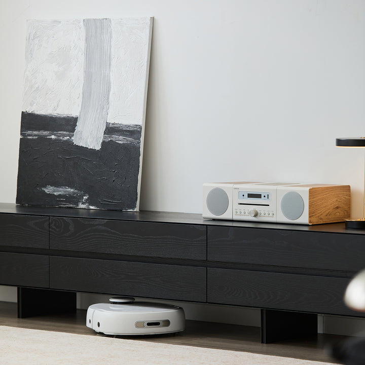 Minimalist ash wood tv console shadow with context.