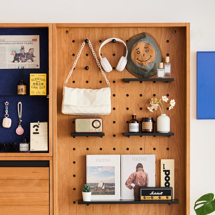 Scandinavian cherry wood shoe cabinet corner with context.