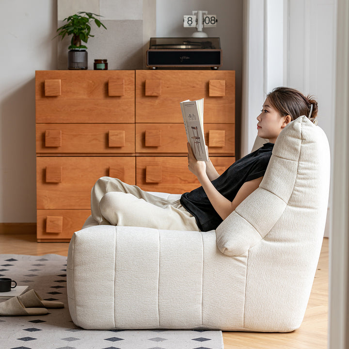 Cream chenille velvet fabric 2 seater sofa curly in details.