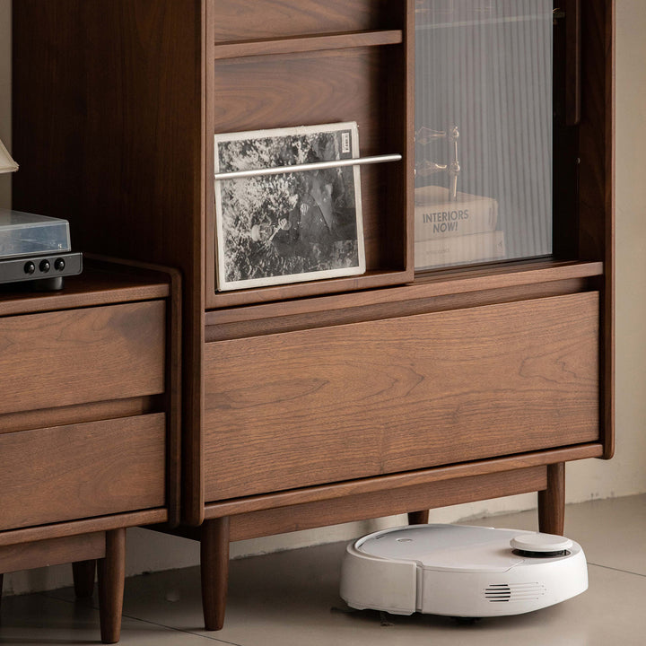 Vintage walnut wood side cabinet vista in close up details.