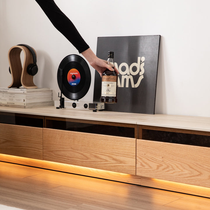 Scandinavian oak wood tv console floating light in panoramic view.