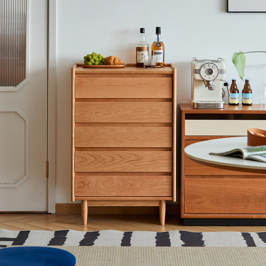 Scandinavian cherry wood chest of drawers vista in panoramic view.