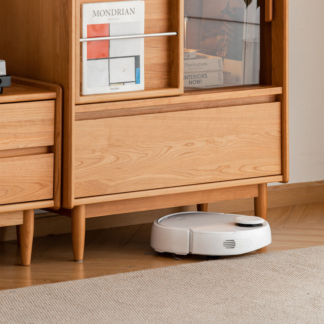 Scandinavian cherry wood side cabinet vista in panoramic view.