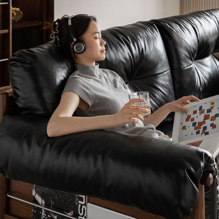 Scandinavian chenille velvet fabric walnut wood 3 seater sofa sofa open backed in close up details.