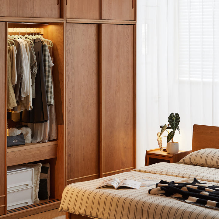 Scandinavian cherry wood sliding door wardrobe autumn in details.