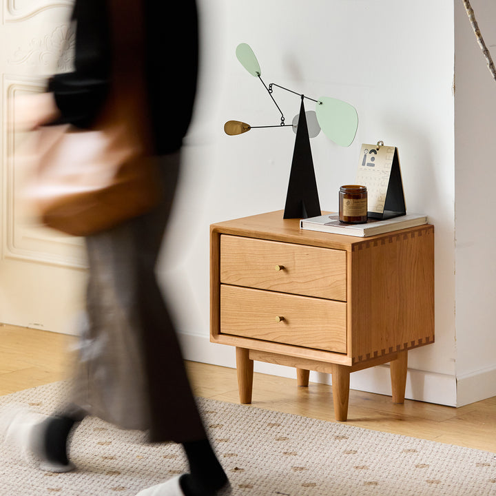 Scandinavian cherry wood side table green in close up details.