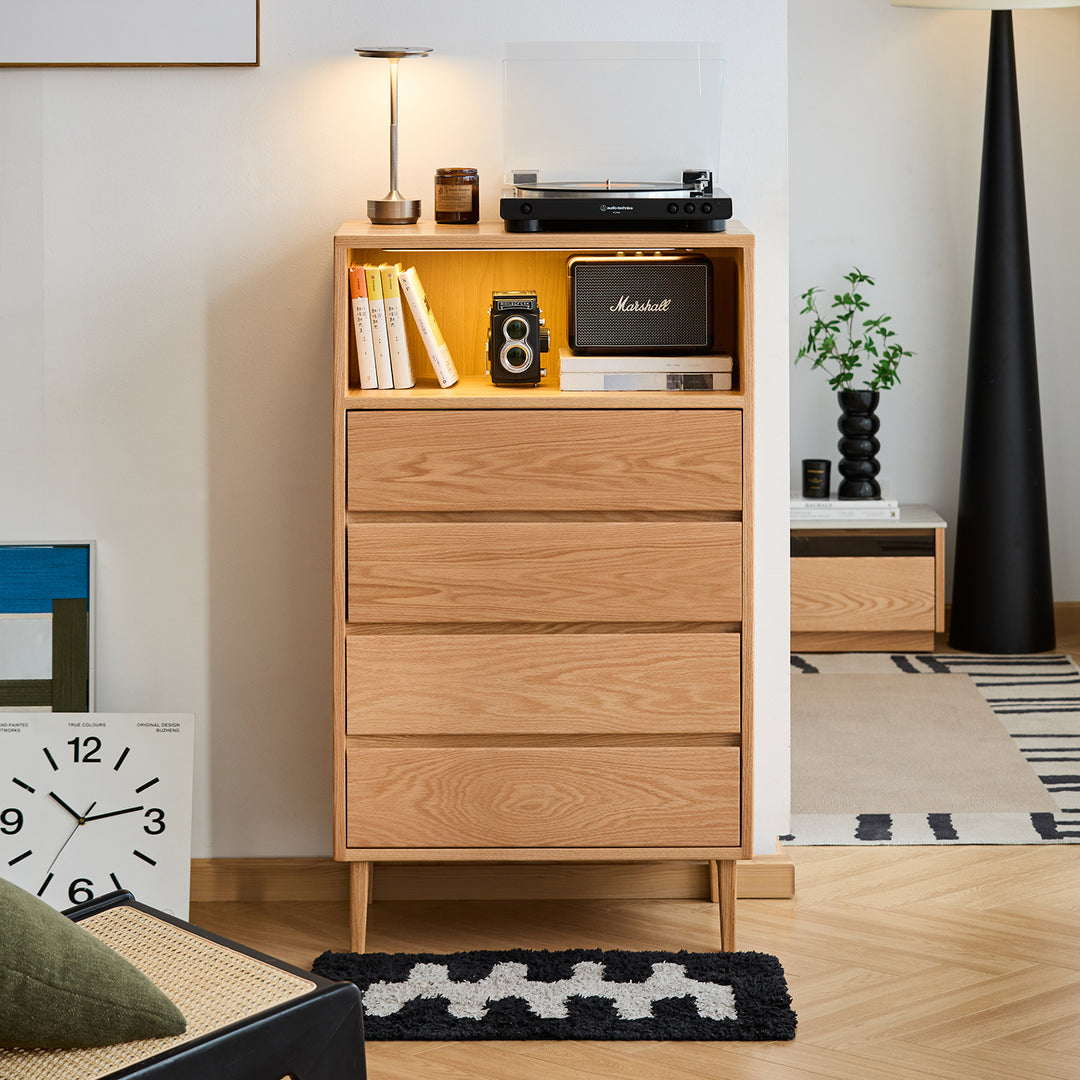 Scandinavian oak wood chest of 5 drawers floating light in panoramic view.