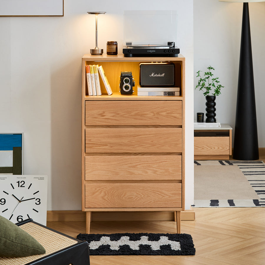 Scandinavian oak wood chest of 5 drawers floating light in panoramic view.