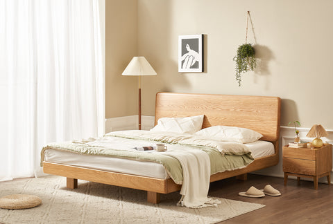 Minimalist bedroom with a wooden bed frame and cozy decor. Explore the bed frame collection at Loft Home Furniture.