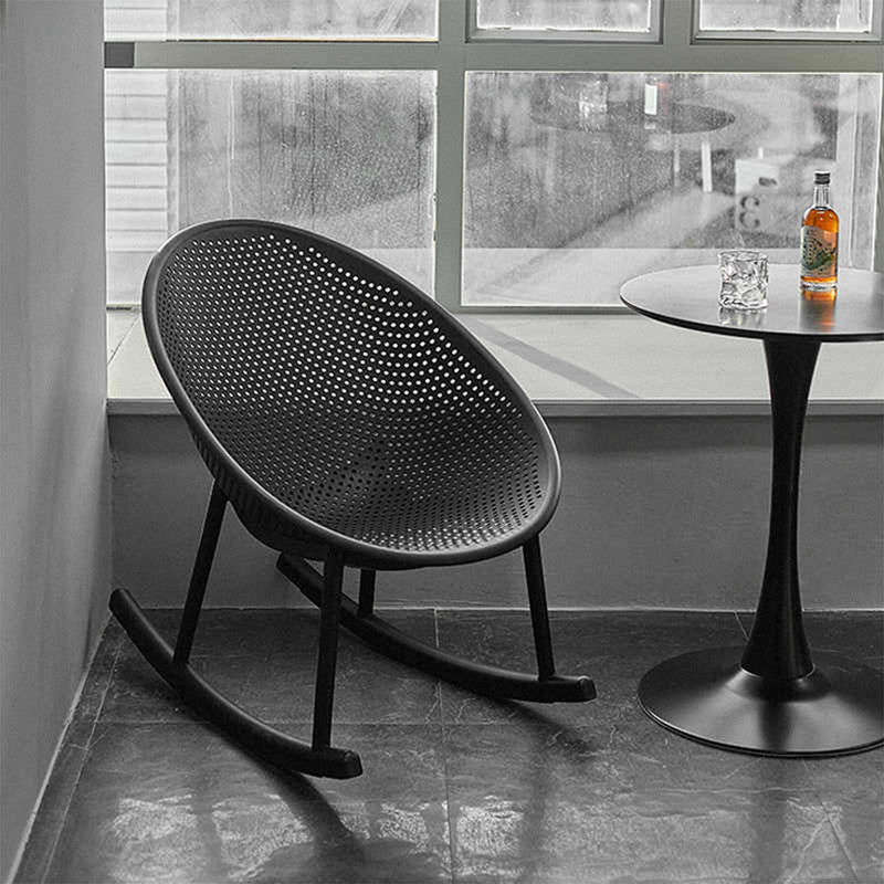 Contemporary plastic rocking chair 1 seater sofa europa in still life.