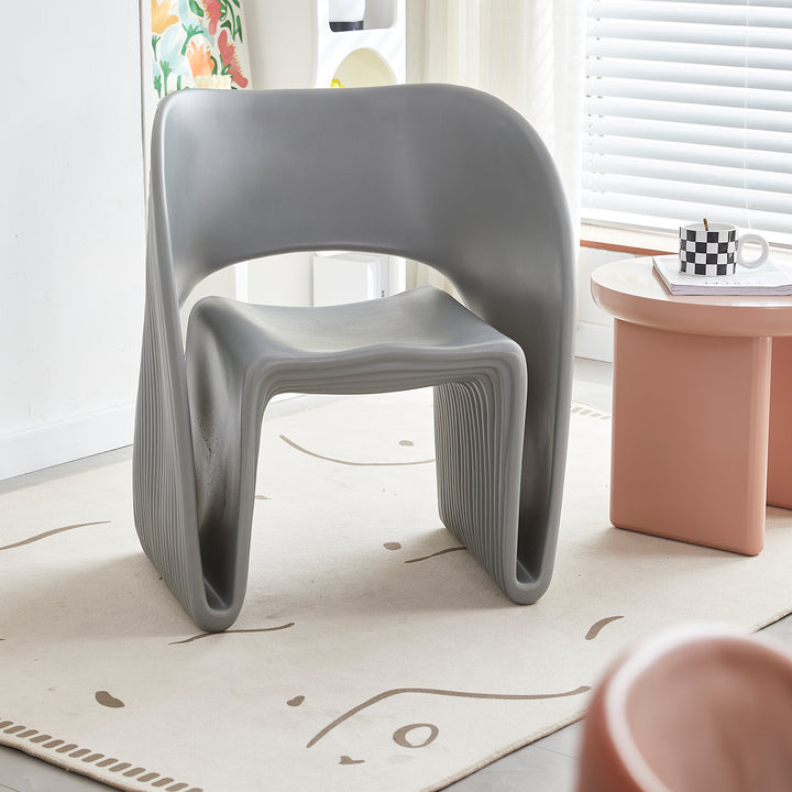 Contemporary plastic dining chair flip in close up details.