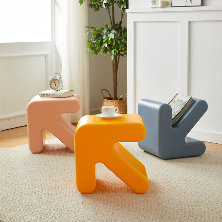 Contemporary plastic stool side table arrow with context.