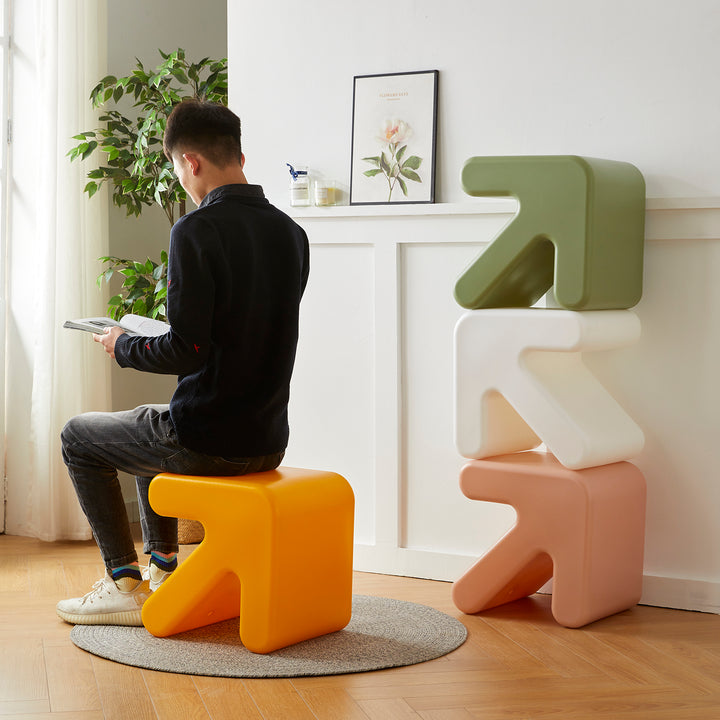 Contemporary plastic stool side table arrow in panoramic view.