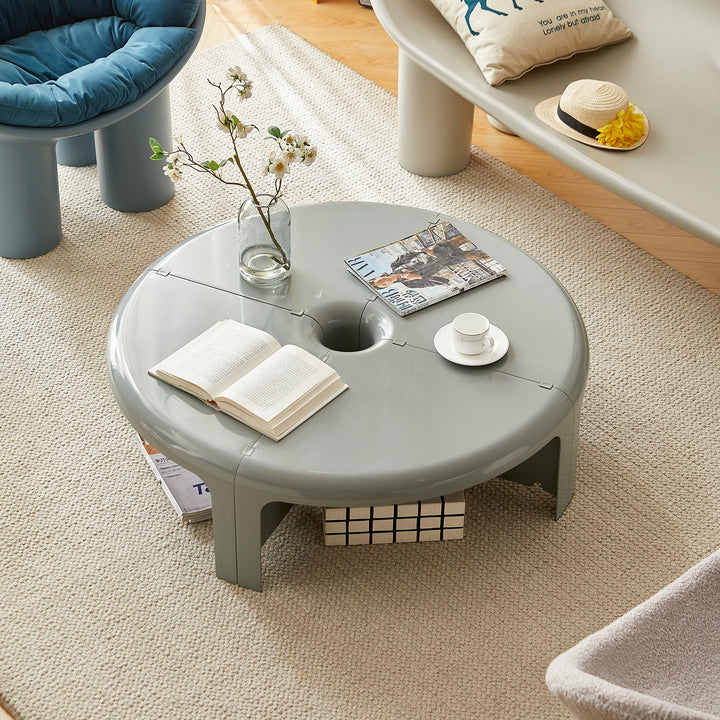Contemporary plastic transformable coffee table domut in close up details.