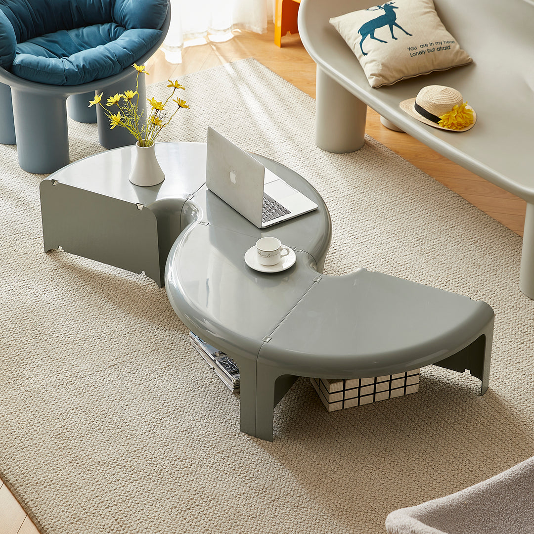 Contemporary plastic transformable coffee table domut in panoramic view.