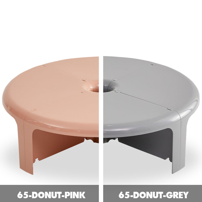 Bauhaus plastic transformable coffee table domut in real life style.