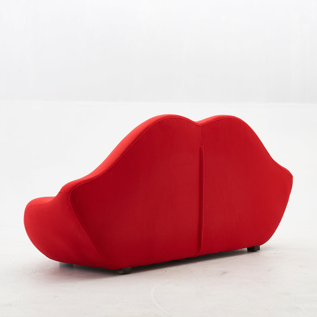 Contemporary velvet 2 seater sofa bocca with context.