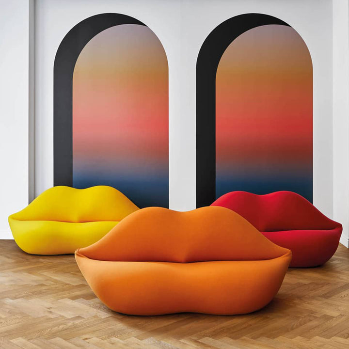 Contemporary velvet 2 seater sofa bocca in still life.