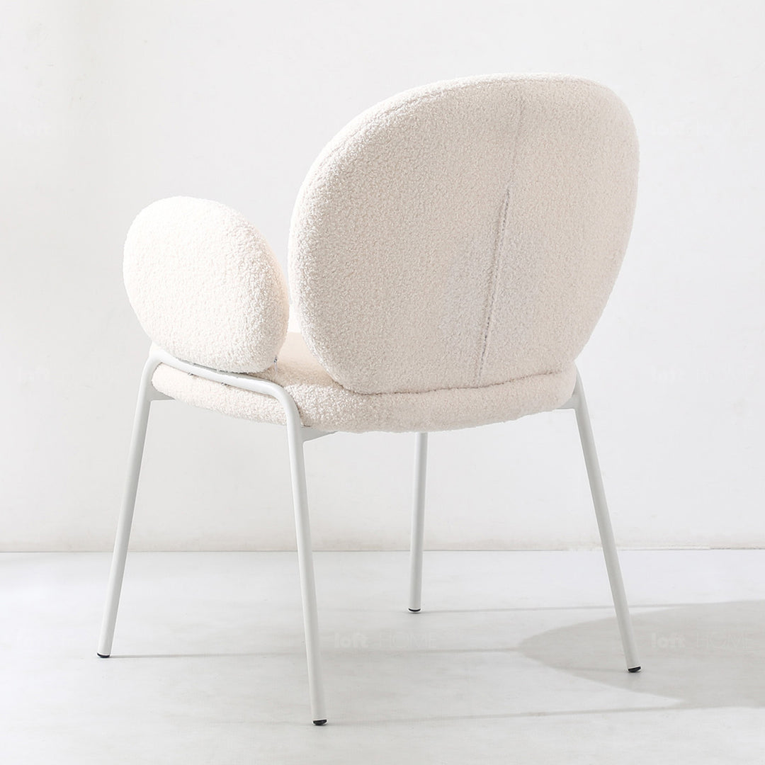 Cream boucle dining chair pavlova i in real life style.