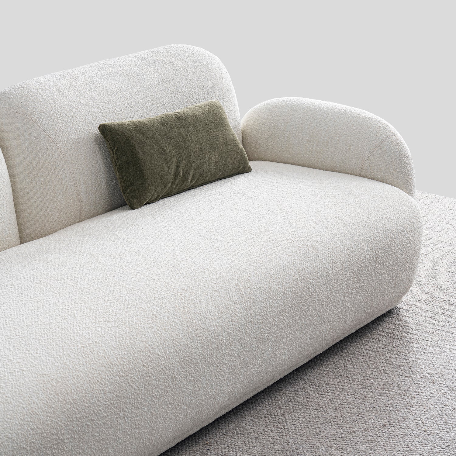 Cream boucle fabric 2 seater sofa pluum in real life style.