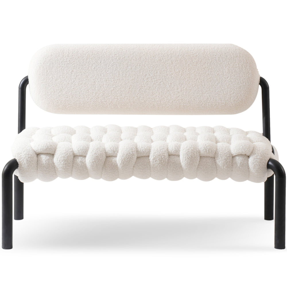 Cream boucle fabric dining bench souffle in white background.