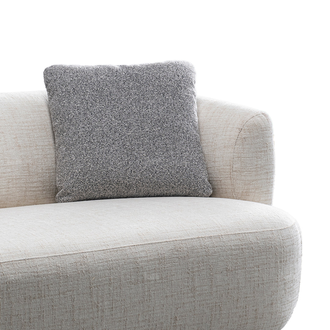 Cream mixed weave fabric 2 seater sofa noiry with context.