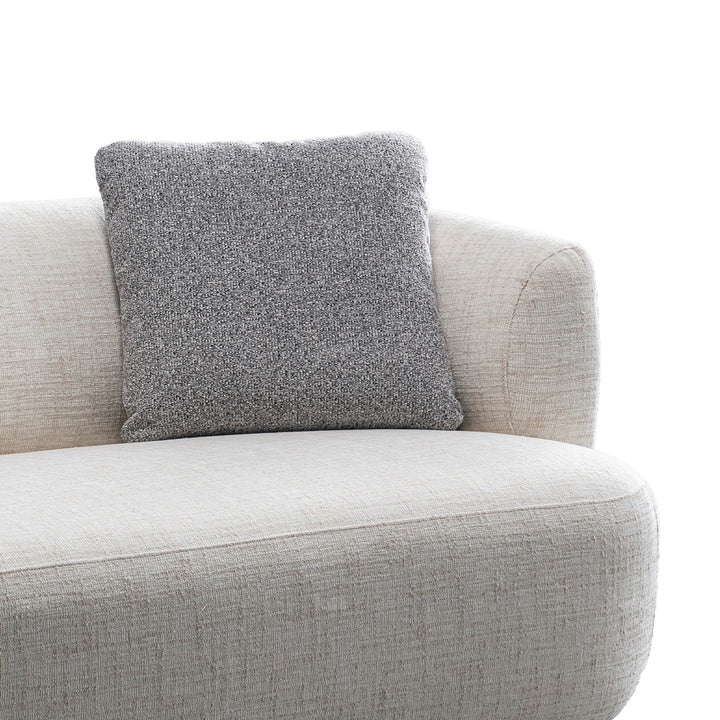 Cream mixed weave fabric 2 seater sofa noiry with context.