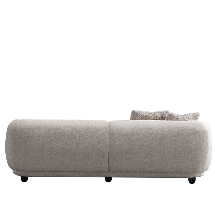 Cream mixed weave fabric 3 seater sofa puffy in details.