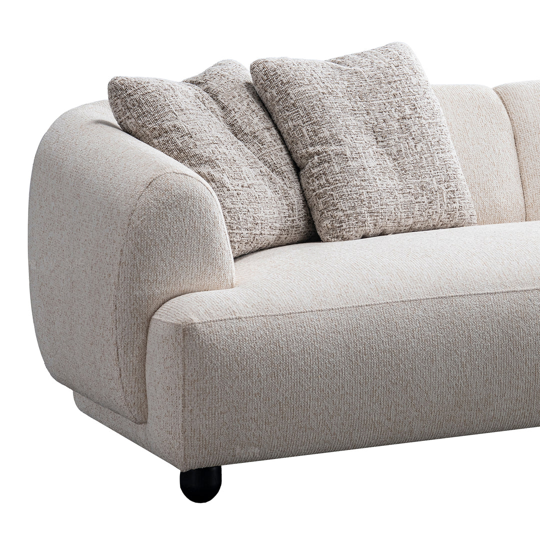 Cream mixed weave fabric 3 seater sofa puffy in close up details.