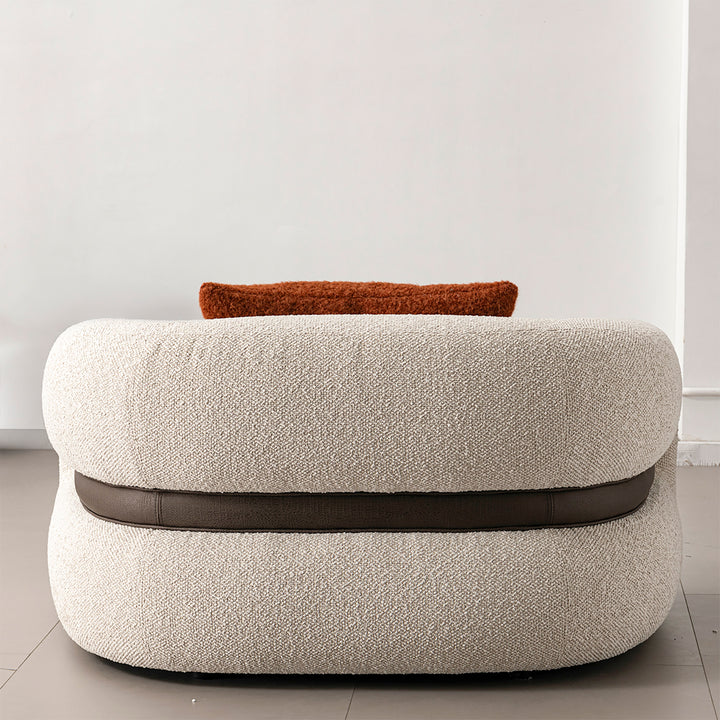 Cream boucle fabric 1 seater sofa curly in panoramic view.