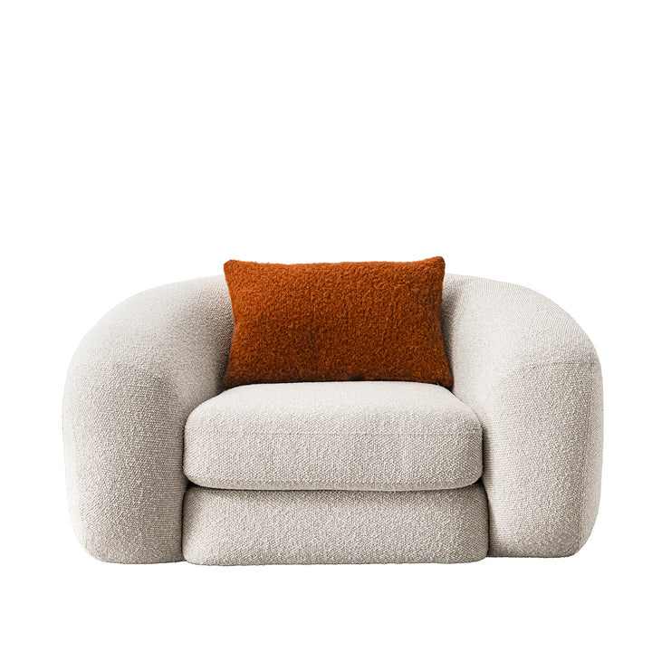 Cream boucle fabric 1 seater sofa curly in details.
