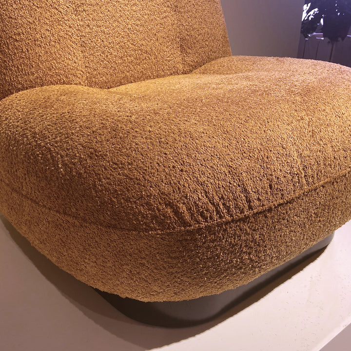 Cream boucle fabric 1 seater sofa velora in still life.